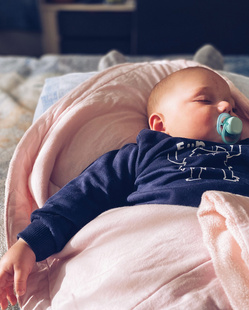 baby sleeping with pacifier